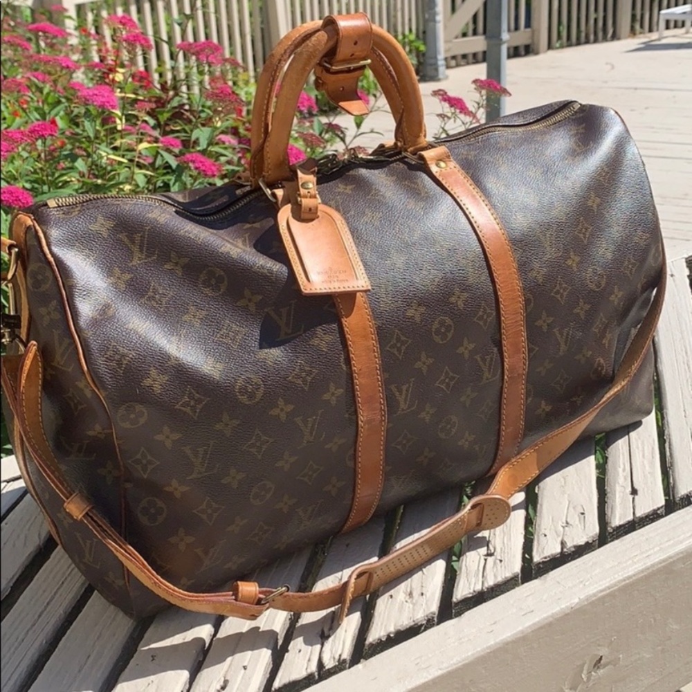 Authentic- Louis Vuitton Bandouliere Monogram Keepall